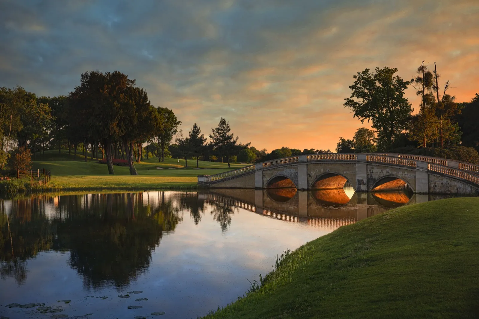 The bridge on the Colt course at sunset